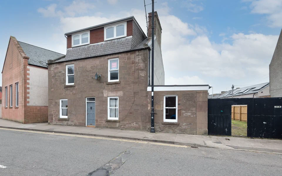 Street-facing exterior of the Baltic Street property in Montrose